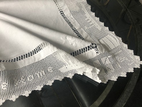 Antique tablecloth pulled