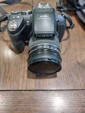 Fuji digital camera finePix HS10 with camera case
