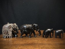 Family of Four Ebony Elephants
