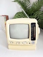 Vintage 1970s Kingavon portable black and white television, built-in AM/FM radio
