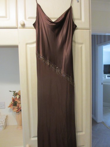 Brown dress with - , scarf.