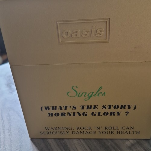 Oasis singles what the - oasis,