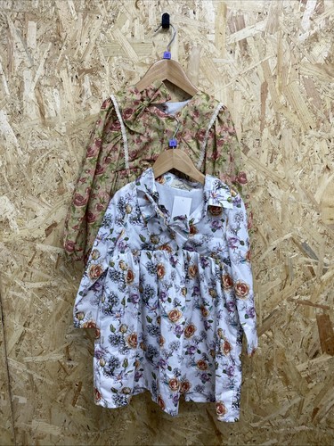 Dolly wears girls smock - wears,