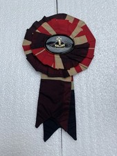 Vivienne Westwood Rosette Broach with Enamel Orb Centre £105