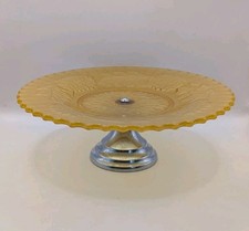 vintage Art Deco amber glass cake stand with a chrome-plated foot.