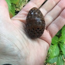 Old pierced coquilla nut egg - old,