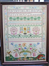 Framed MidC fine needlework sampler
