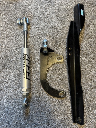 Engine torque damper brace