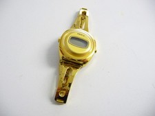 Vintage Timex wrist watch; LCD digital screen; gold metal case; 1970's era