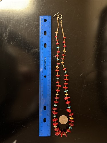 Red coral heishi puka shell - red,