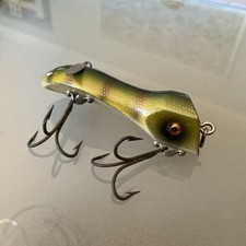 VINTAGE PFLUEGER WIZARD GLASS EYED WOODEN FISHING LURE.