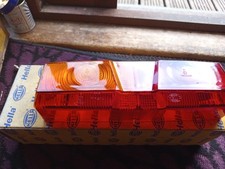 NOS/ Boxed Hella Left Hand Rear Lens For Case/John Deere Tractors. 9EL 115