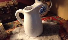 White stonewear jug 10" tall x