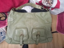 Tommy & Kate green shoulder