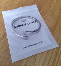 Warren James Clear Swarovski Crystal Hinged Bangle. New Without Tags
