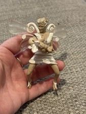 Schleich figurine of a fairy holding a baby