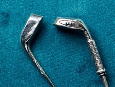 Two Silver Topped Golf Club