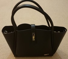 Beau baby changing bag in Black Faux leather with accessories