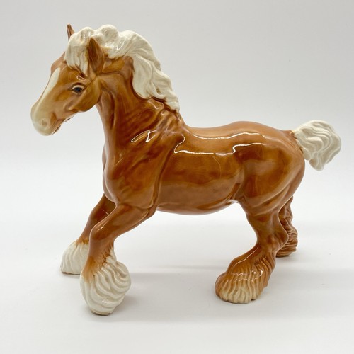 Beswick palomino cantering - palomino,
