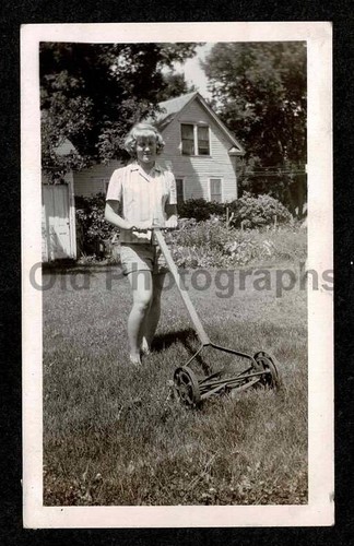 Young lady cutting - cutting, grass