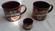 Pair of Vintage Smarties Mugs and single Smarties Egg Cup. 