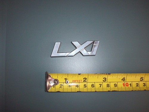 Suzuki lxi badge original - "lxi",