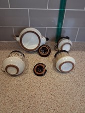 Stoneware teapot, mug, milk jug and sugar pot