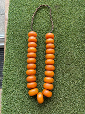 A LARGE  LONG 23 BEAD STRAND