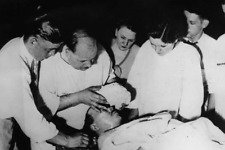 Taking death mask of John