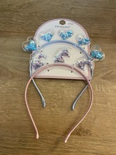 2x Primark plastic glitter hairbands.