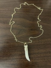 White Jade Tiger Tooth Pendant