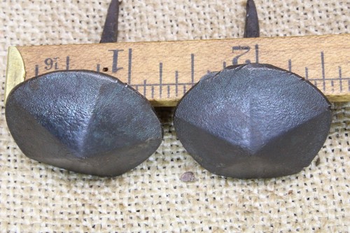 Two rosehead nails - two, 1/2"