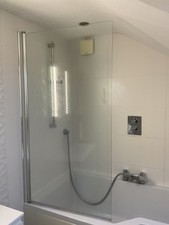 Glass shower screen with chrome effect hinge  77.5cm wide x 141.5 cm high 