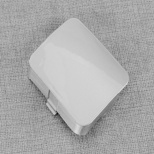 Front bumper tow hook cover - front,