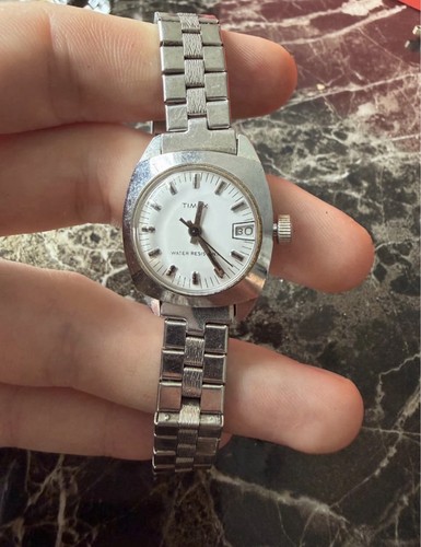 Timex water resistant - water, manual