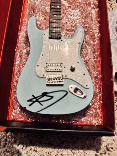 Autographed tom delonge - autographed,