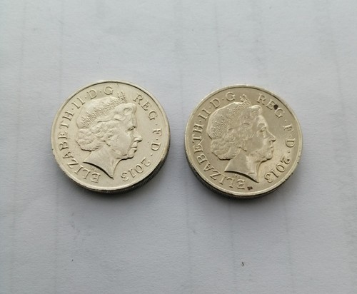 One pound coins - pound, floral
