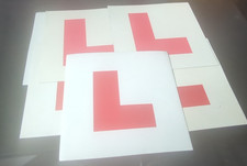 L plates magnetic car moped learner driver road united kingdom British red white