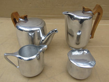 PICQUOT WARE  FOUR PIECE TEASET TEA POT WATER JUG SUGAR BOWL  AND MILK JUG