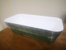 rectangular plastic bowl colour green. 33 cm x 17 cm length 