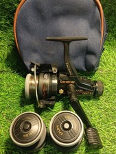 A Vintage Abu Garcia Cardinal Ultra Cast 63 With Two Spare Spools And Reel Case.