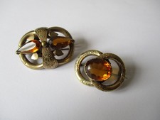 Victorian gold tone tubular brooch with glass stones x 2