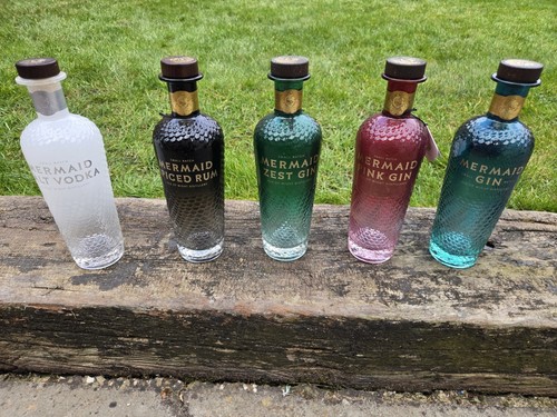 Mermaid gin distillery bottles - gin,