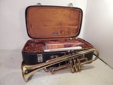 A Corton trumpet with mouthpiece and case