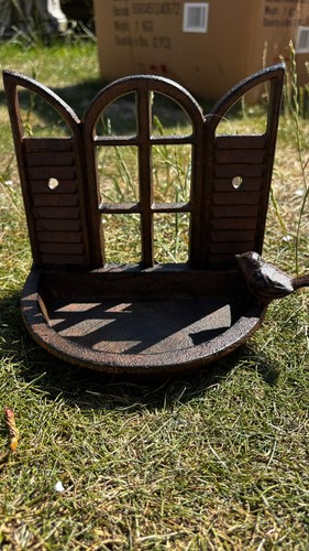 Charming cast iron bird - charming,