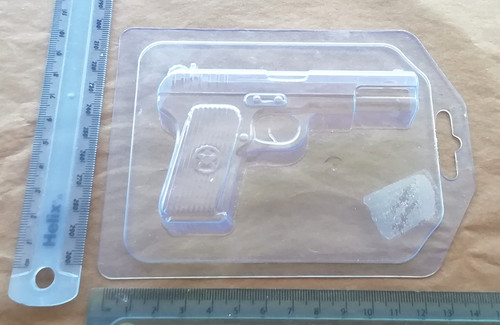 Hand gun chocolate - hand,