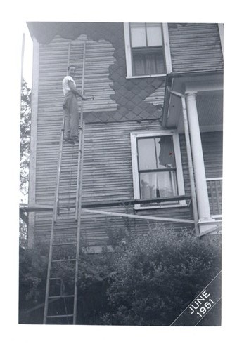 1951 man tall ladder - man,