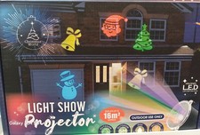 Christmas World Light Show Santa Festive Projector For Indoor/Outdoor Use Xmas