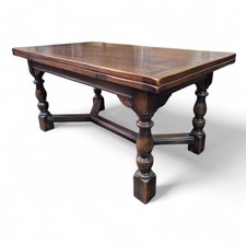 Antique style carved oak extending drawleaf Hayrake dining table 6 seater