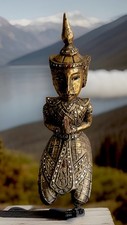 Thai Thepanom Kneeling Praying